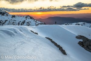 Skiers sunset   from Carruthers Peak